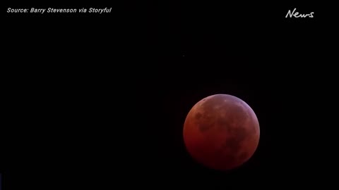 Moon shines blood red in total lunar eclipse