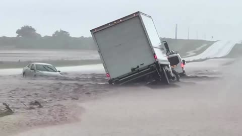 Flash floods inundate Texas highway