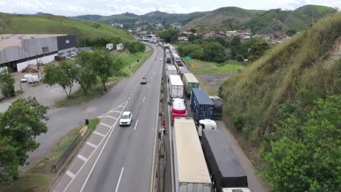 Truckers block highway after Bolsonaro defeat in Brazil election | AFP