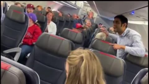 Shitskin wants to play tough, gets handled and escorted out of plane by Alpha White men.