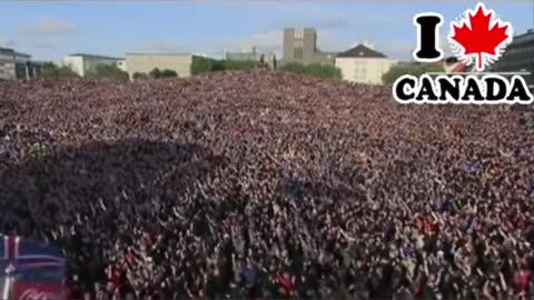 Canadian Freedom Convoy-Thousands of people in square clapping in unison