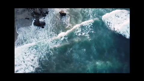 Drone View Of Big Waves Rushing To The Shore