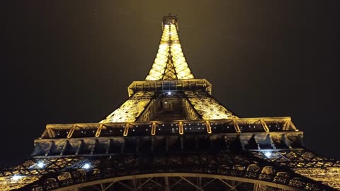 Time lapse_ Lights On Eiffel Tower At Night