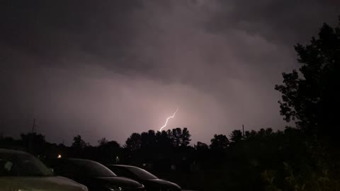 Slow Motion Lightning Branches Through Dark Skies