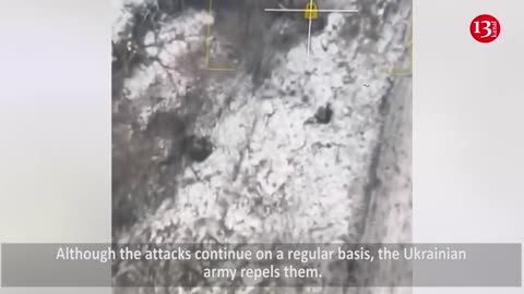 Attacking Soledar city through snowy forests, Russians fall to the ground, seeking to deceive Drone