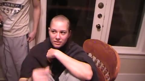 Woman headshave at home