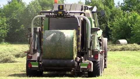 Hay Machine Creates Round Bale Hay