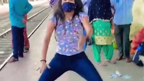 GIRL DANCING ON RAILWAY STATION