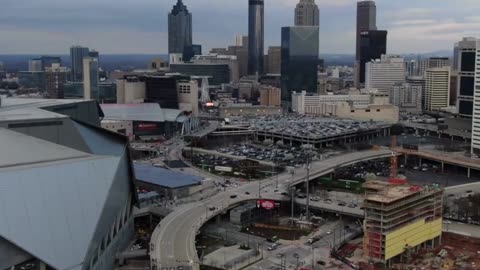 DRONE FOOTAGE OF THE MERCEDES BENZ STADIUM & DOWNTOWN ATL