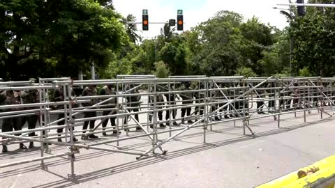 Armored vehicles patrol curfewed Colombo streets