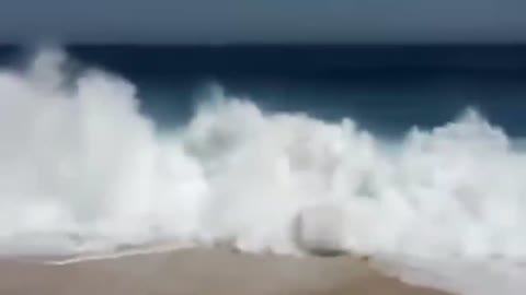 people slammed by massive waves