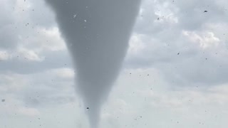 Beautiful Tornado Whirls Through Hillside