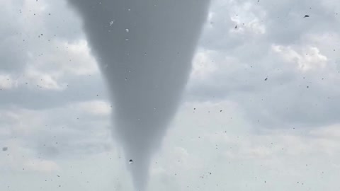 Beautiful Tornado Whirls Through Hillside