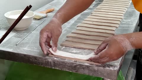 Handmade biscuits, fried dough sticks making