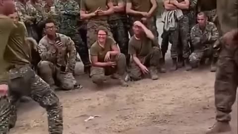 Friendly Knife Fighting Between Marine And USMC