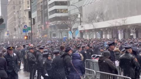 A Touching Scene as the NYPD Gathers at St. Patrick's Cathedral to Honor a Fallen Officer