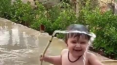 cute baby bathing