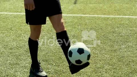 Close Up Of An Unrecognizable Soccer Player Training Freestyle Tricks With The Ball On A Street Foot