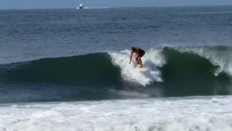 Surf Girls Riding Waves at Surf Beach