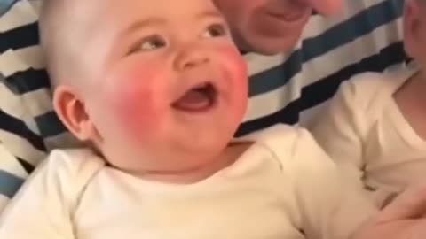 Cute baby laughing