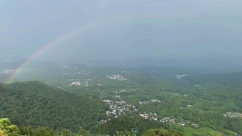 A rainbow appeared in the sky after the rain