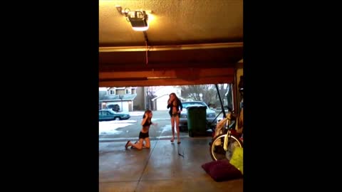 Girl Runs Face First Into Closing Garage Door