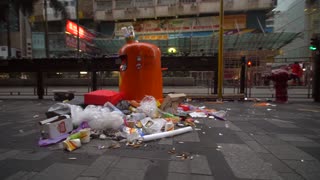 Crowded trash cans in the city