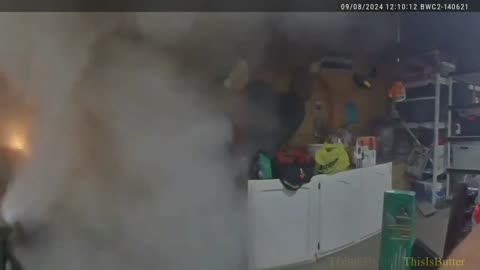 Body cam shows Roscommon Co. deputy run into burning garage, putting out fire