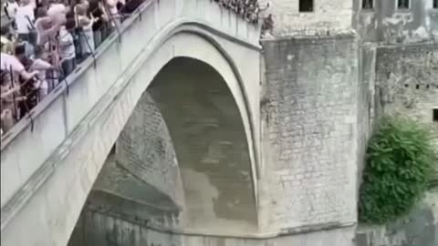 Man jumping off the bridge