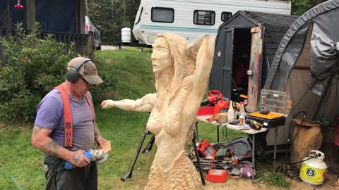 Chainsaw carving my first mermaid