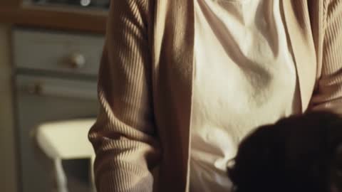 A Woman Serving The Roasted Turkey In The Dining Table