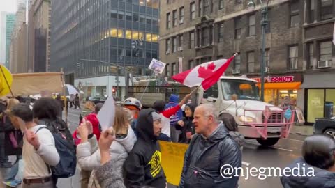 In front of the Canadian consulate. NYC activist show support for the people of Canada