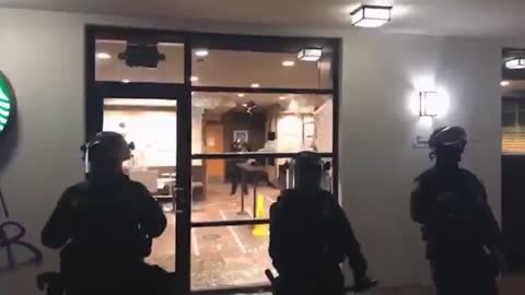 Antifa smash a Starbuck windows and throw kerosene in it. Above in same building 300 apartments.