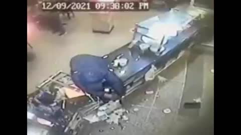 Robber Gets a Bullet Headache