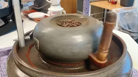 Please Grind the Coffee Beans using the auto Millstone.