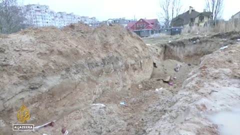 Hundreds Buried in Mass Grave In Bucha,Near Kyiv:Mayor