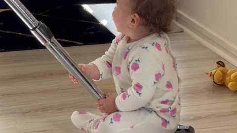 Cute Kiddo Loves Riding on the Vacuum