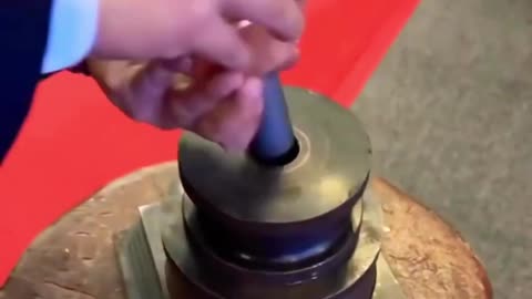 Hammering a coin for print -(1080p)