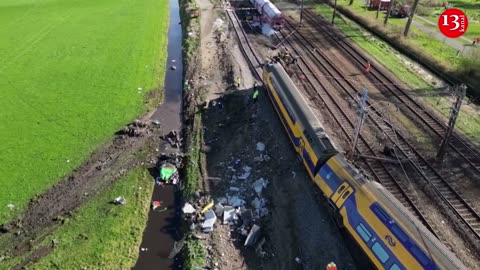 Drone shots show Netherlands train crash site