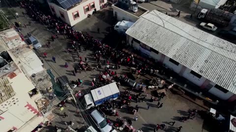 Drone shows Gazans queueing for food in Rafah