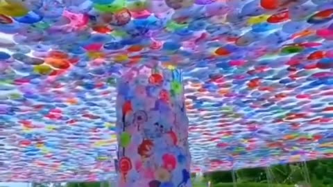 Hundreds of traditional oil-paper umbrellas form a giant parasol in Qujing southwest China's Yunnan