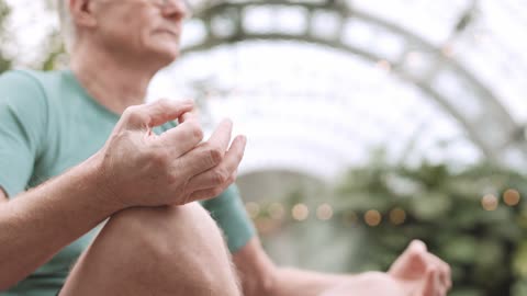 Man Meditating and Practicing Yoga