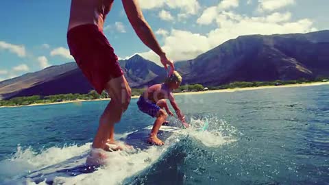 Dad and sun surfing