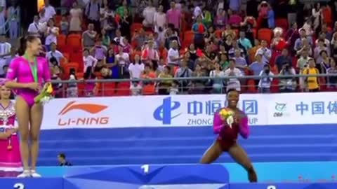 Bee scares Simone Biles