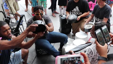 Drummer using plastic buckets on the Las Vegas Strip.