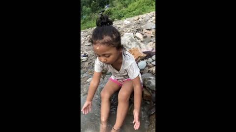 Kid having fun in river