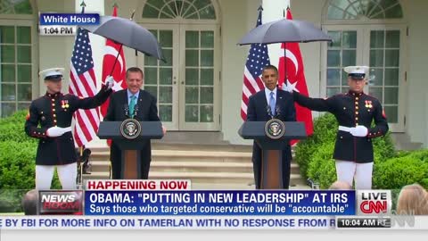 Obama asks Marines for umbrellas