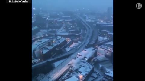 Looking down on the snowy rooftops of Manchester