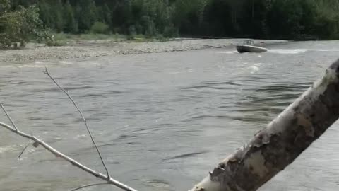 Boat Jumps River Blockage