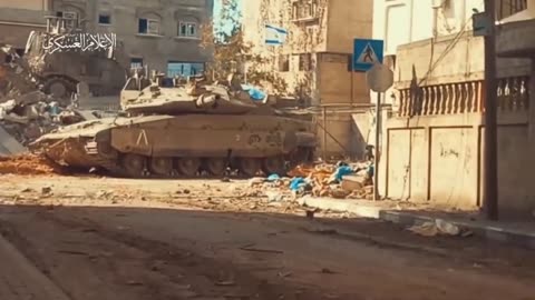 Fighters from the Izz al-Din al-Qassam Brigades work against IDF armored vehicles